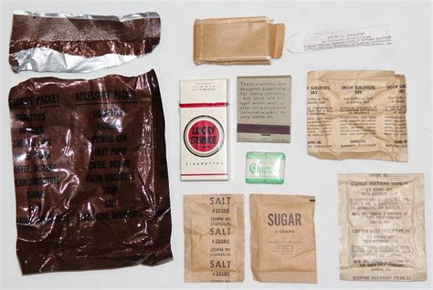 T074. OPENED VIETNAM C-RATION ACCESSORY PACK WITH LUCKY STRIKE CIGARETTES - B & B Militaria