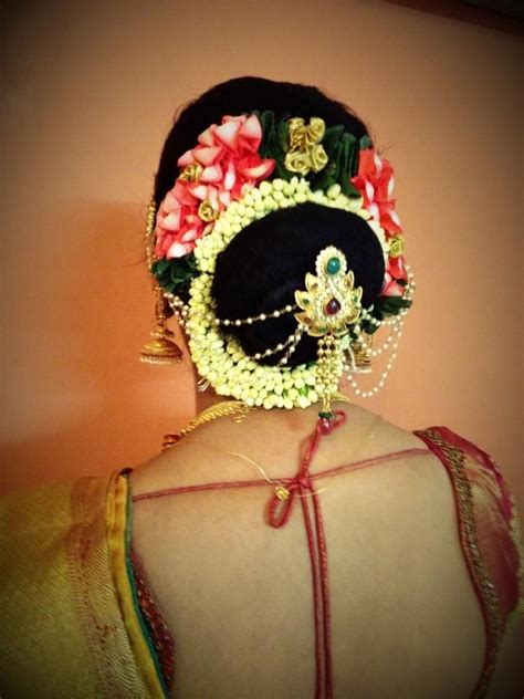 South Indian bride | bridal hairstyle hair bun | Indian bridal hairstyles, Bridal hair buns ...