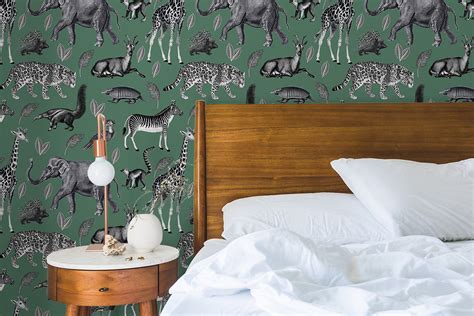 Sage green design wallpaper with animals. Let them in!