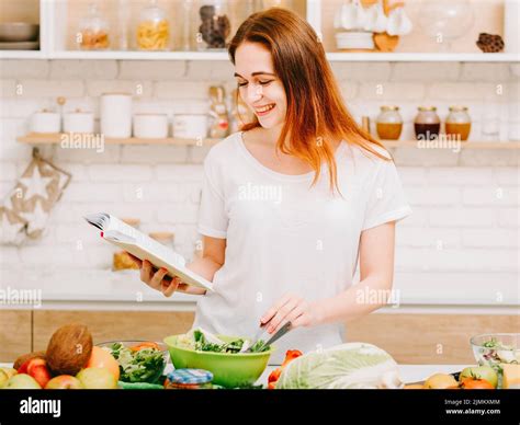 cooking hobby fun home leisure woman kitchen Stock Photo - Alamy