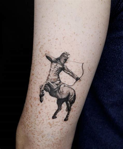 Micro-realistic Centaur tattoo on the tricep