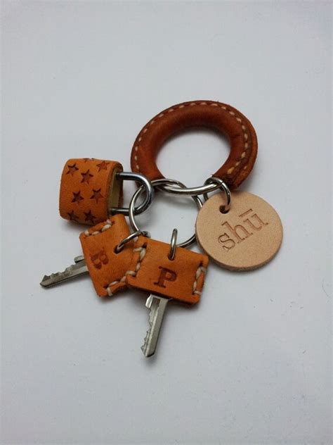 Items similar to Leather key chain with master key on Etsy