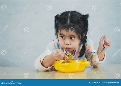 Asian Baby Girl Enjoy Happy Using Cutlery Spoon and Fork Eating ...