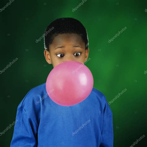 Boy Blowing Huge Bubble With Bubble Gum Stock Photo by ©DesignPicsInc ...