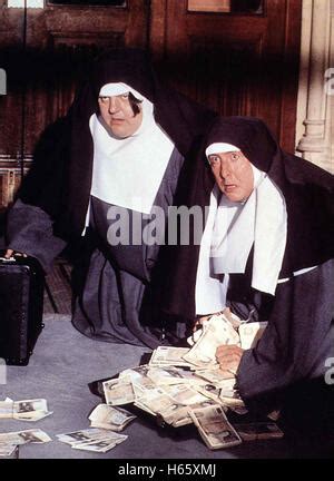 NUNS ON THE RUN (1990) ROBBIE COLTRANE, ERIC IDLE NSR 001 Stock Photo - Alamy