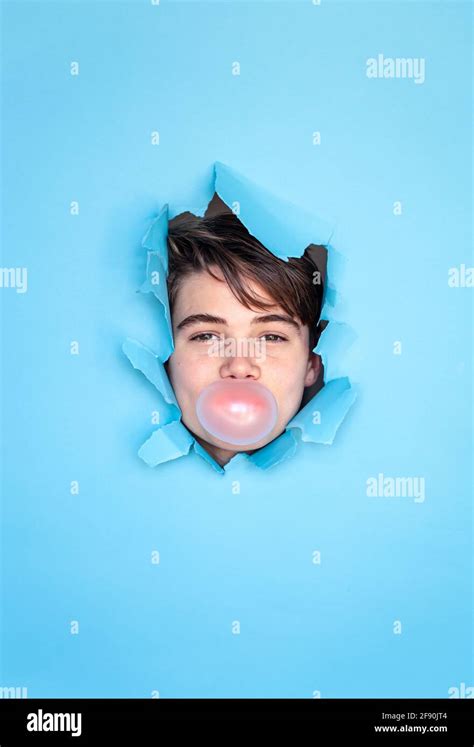 Boy blowing bubble gum hi-res stock photography and images - Alamy