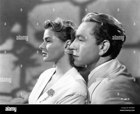 INGRID BERGMAN as Ilsa Lund PAUL HENREID as Victor Laszlo Publicity Portrait CASABLANCA 1942 ...