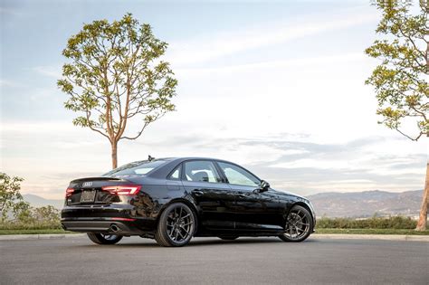 Vorsteiner Redesigns Elegant Black Audi A4 — CARiD.com Gallery