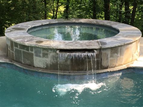 Premier pools and Spas pool in Ellijay Ga. Gorgeous raised spa in the pool! Www.ppas.com Premier ...