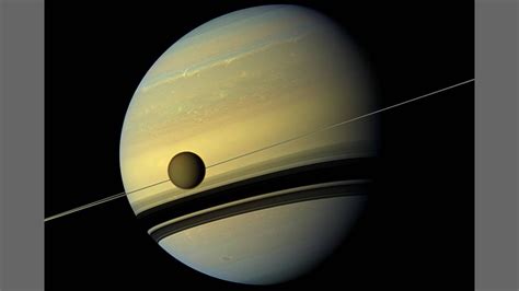 Saturn's largest satellite, Titan, is drifting away from its planet 100 ...