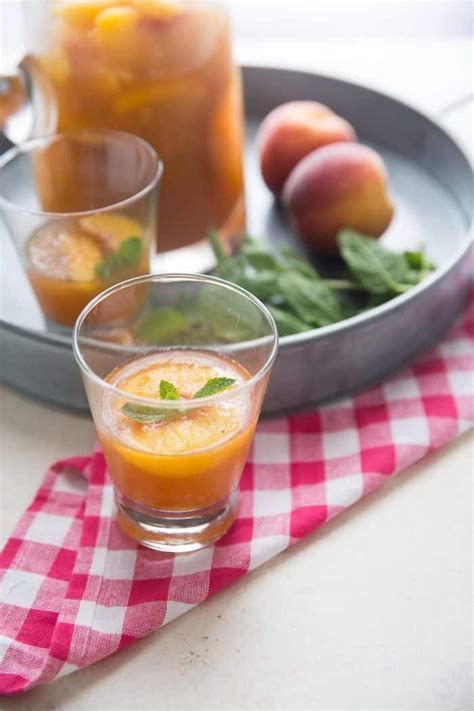 Peachy Bourbon Slush Punch - LemonsforLulu.com