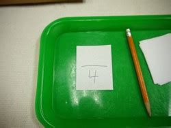 File:Writing Fractions 3.JPG - Montessori Album