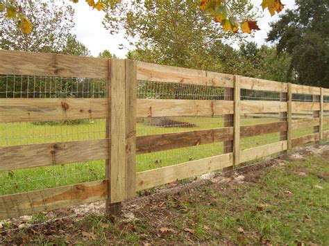 Custom wood horse fence design with wire for added protection. Mossy Oak Fence Company, Orlando ...