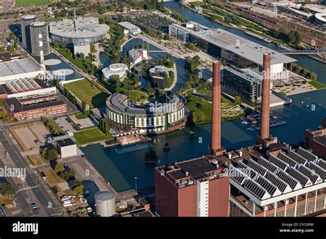 Aerial view of Volkswagen Autostadt, factory halls and park, Wolfsburg ...