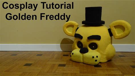 a stuffed animal with a top hat on it's head and the words, cosplay tutor golden teddy