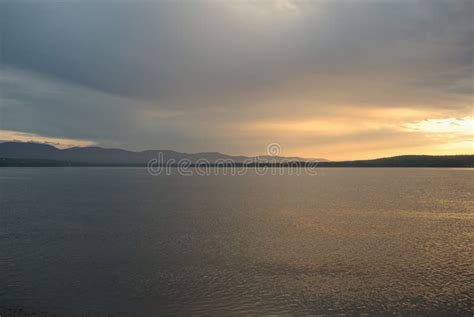 Gray sunset stock image. Image of yellow, mountain, clouds - 6004371