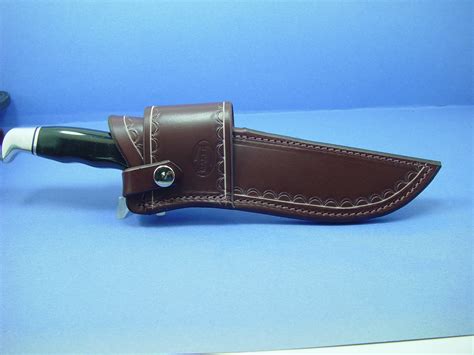 Buy Custom cross draw sheath for a buck 120 . This sheath is made out of 10 ounce water buffalo ...