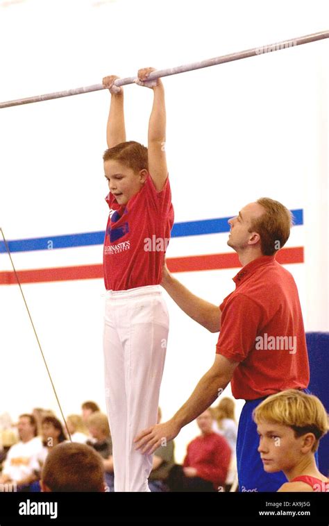 boys perform gymnastics routines Stock Photo - Alamy