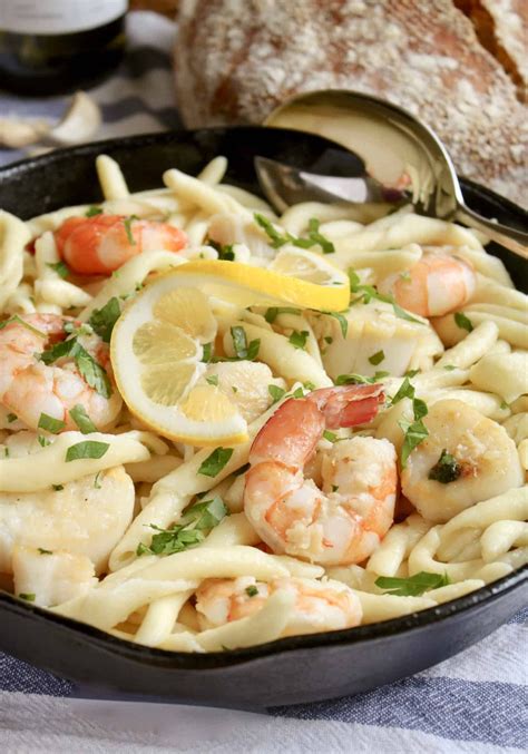 seafood pasta in a cast iron pan | Seafood pasta recipes, Seafood pasta, Cooking seafood