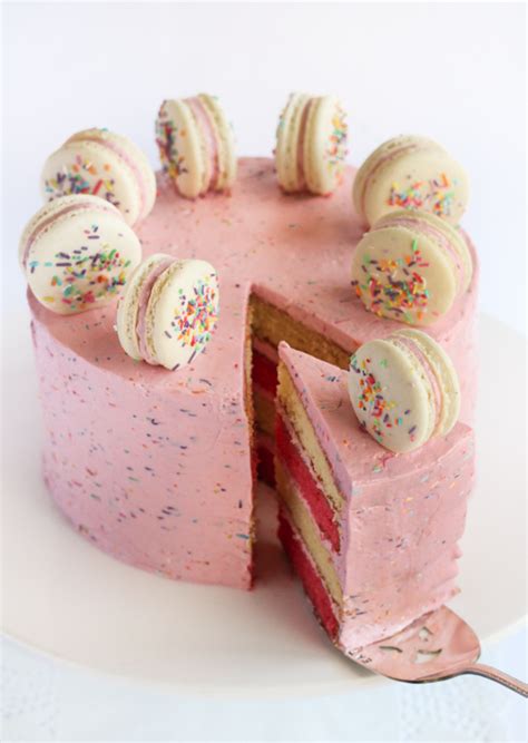 raspberri cupcakes: Pink & White Layered Sprinkle Cake with Macarons