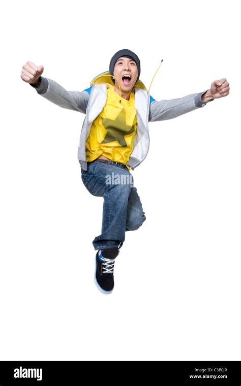 Excited man jumping up Stock Photo - Alamy