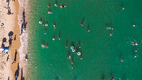 These Beautiful Photos Show How China Spends Its Summers by the Beach ...