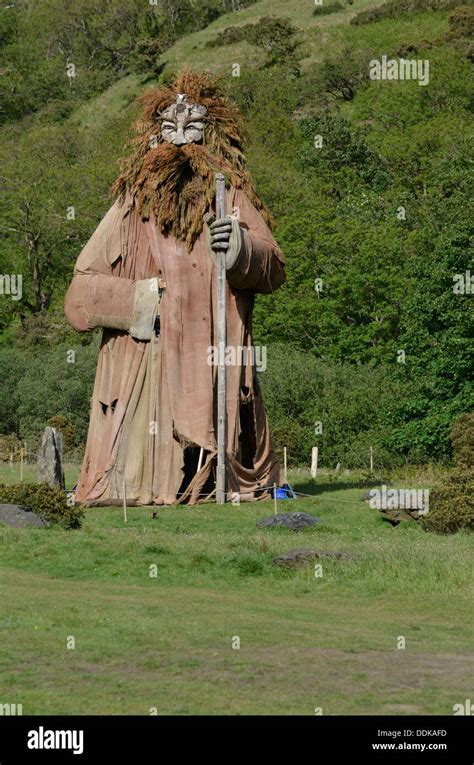 wooden carved statue of manannan isle of man Stock Photo - Alamy