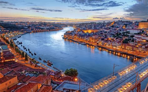 Download Portugal Riverscape At Night Wallpaper | Wallpapers.com