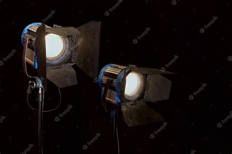 Premium Photo | Professional studio lights on a black background