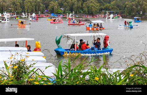 Baguio, Philippines - December 20, 2019: People Riding Boats at Burnham ...