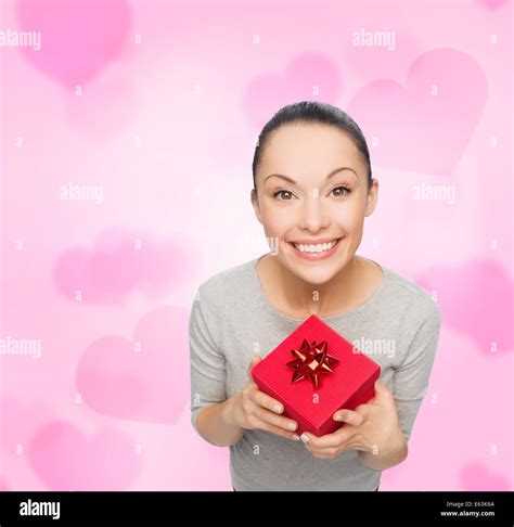 smiling asian woman with red gift box Stock Photo - Alamy