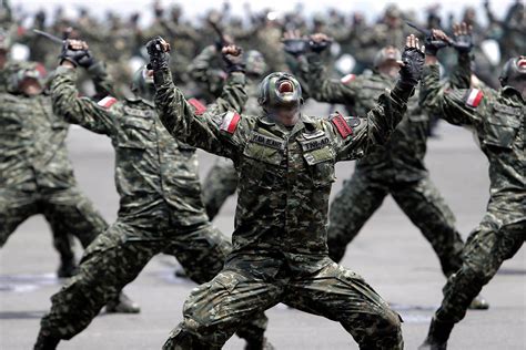 Indonesian Army Commandos (Kostrad) in a martial arts demonstration during a ceremony ...