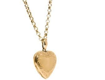 Finding & Caring for 14K Gold Photo Engraved Lockets | LoveToKnow