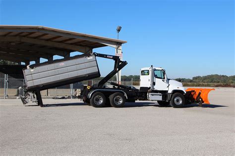 Hooklift Truck Guide: Options, Benefits, and Costs | PTC