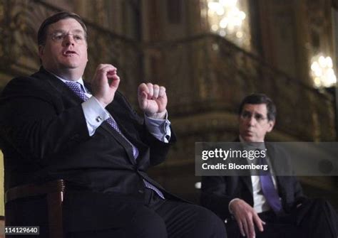 Greg Case, president and chief executive officer of Aon Corp., left,... News Photo - Getty Images