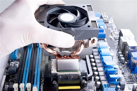 Installing CPU cooler Stock Photo by ©Yourluckyphoto 6191104