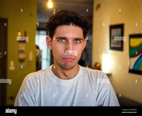 Pensive Handsome Young Man with Sad Face Stock Photo - Alamy