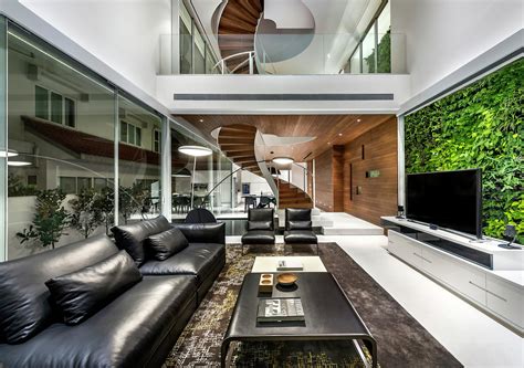 Home Interior Design — Double-height living area is enclosed mostly by...