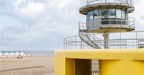 Modern Lighthouse on Beach · Free Stock Photo