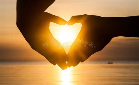 Hand Make Heart with Sunset Stock Photo - Image of concept, heart: 34476416