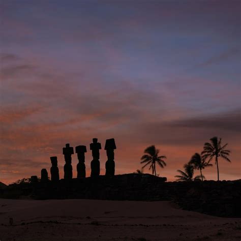 Premium Photo | Silhouette shot of moais at anakena beach in easter island chile sunrise