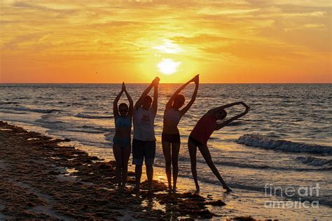 Beach scene at sunset at Bean Point Beach on Anna Maria Island, Photograph by William Kuta ...