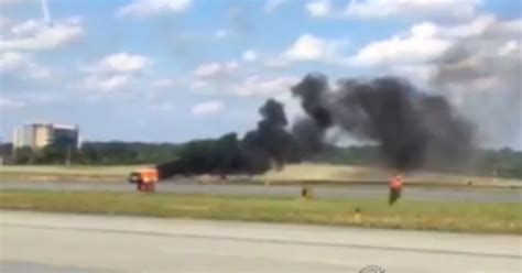 Horrifying moment stunt plane pilot is killed in airshow crash in front of terrified families ...