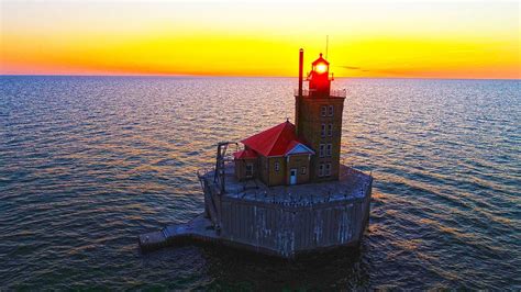 Port Austin reef Lighthouse Photograph by Coulter Stuart - Fine Art America