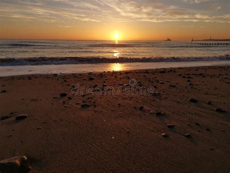 Scottish beach Sunset stock photo. Image of water, sunset - 174880634