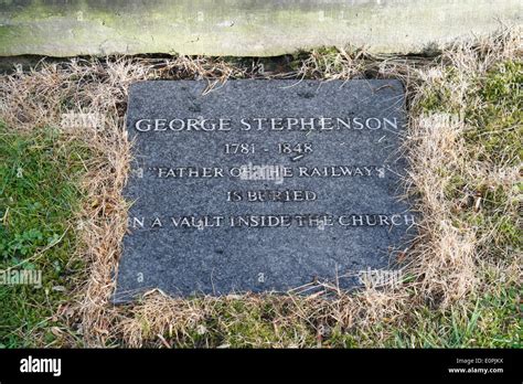 Memorial to George Stephenson the railway pioneer, at his burial place ...