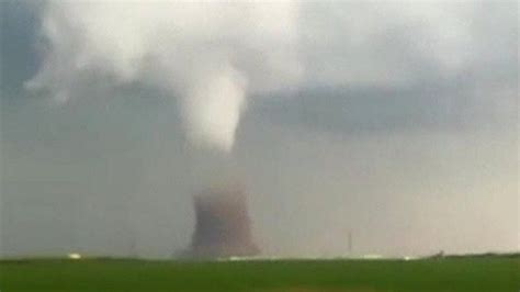 Romania tornado overturns bus and leaves 12 hurt - BBC News