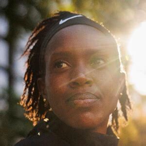 Faith Kipyegon - Age, Family, Bio | Famous Birthdays