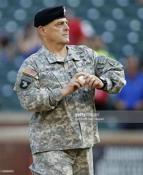 U.S. Army Lt. General Mark Milley throws out a ceremonial first pitch ...