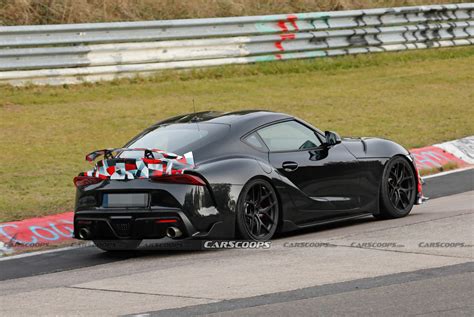 2025 Toyota Supra GRMN Spied With Canards And Rear Wing, Could Pack BMW M4 Power | Carscoops